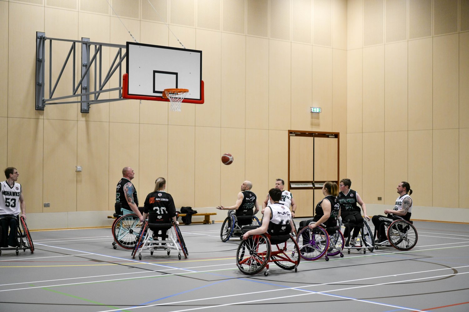 People playing wheelchair basketball at the Sands Centre