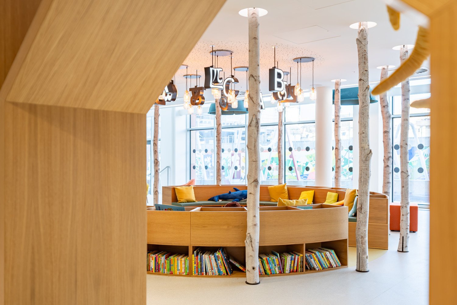 Library reading nook with birch trees