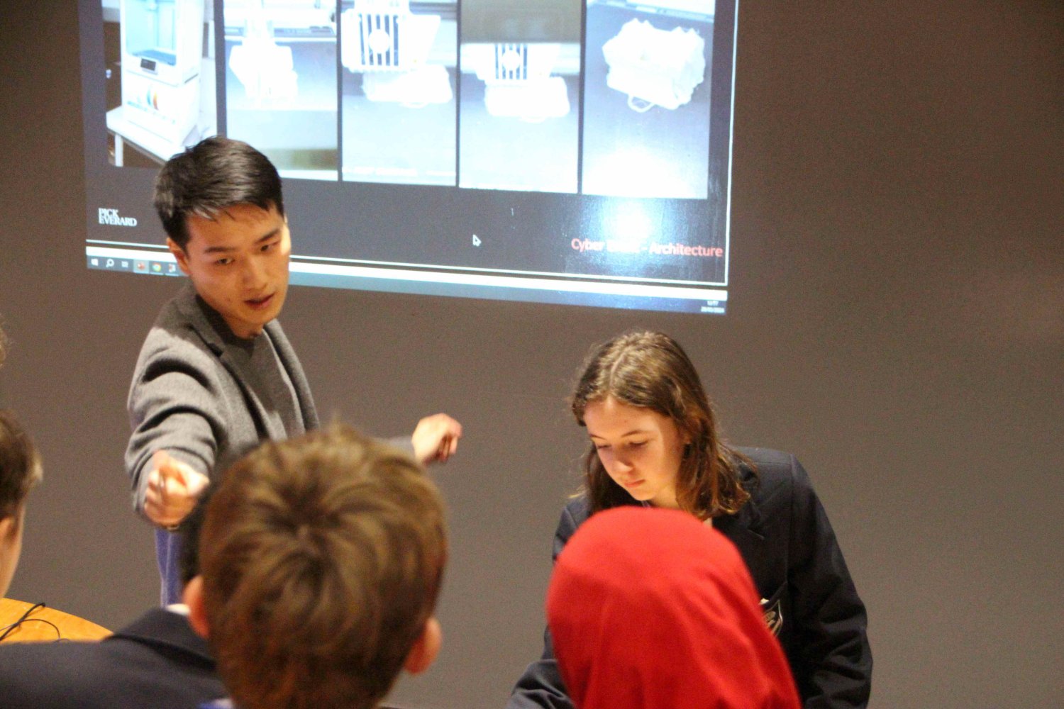 Chong Wong teaching VR workshop to school children