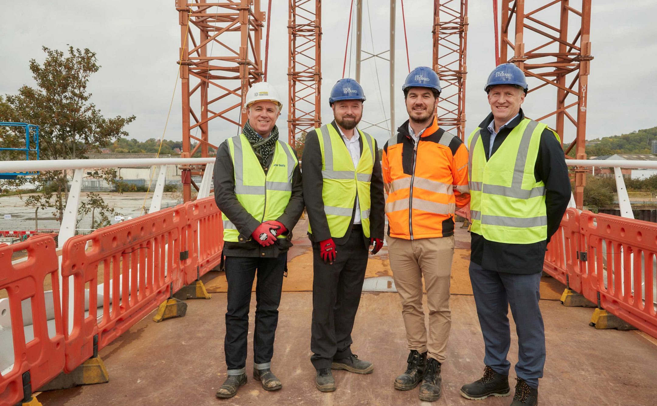 Pick Everard employees standing on bridge