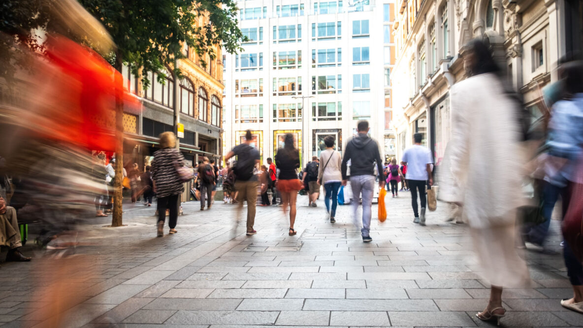 A UK high street with shoppers