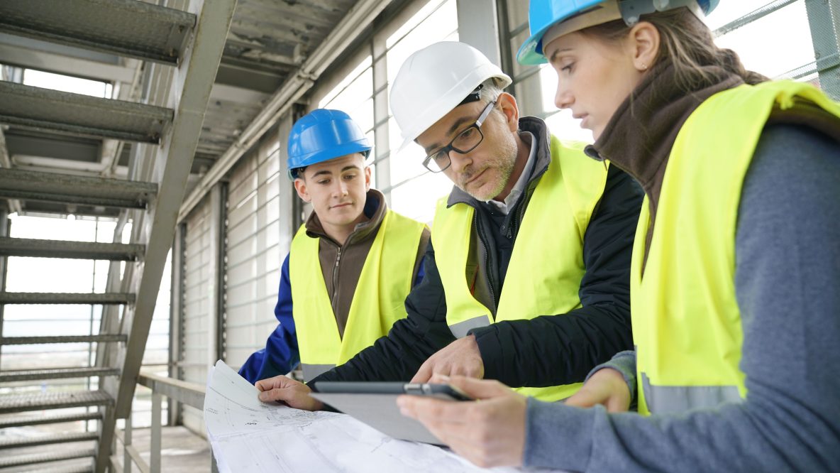 People looking at a plan
