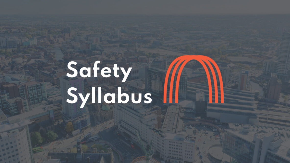 Skyline with wording Safety Syllabus