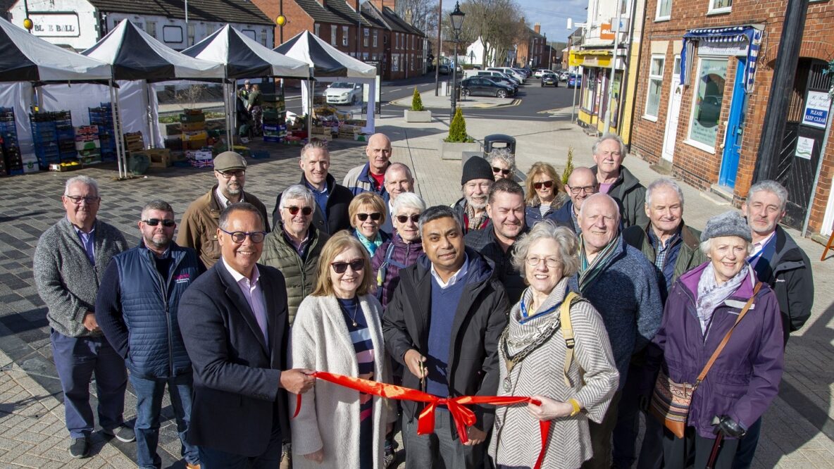 Stakeholders involved in the Shepshed Market Place cutting the ribbon
