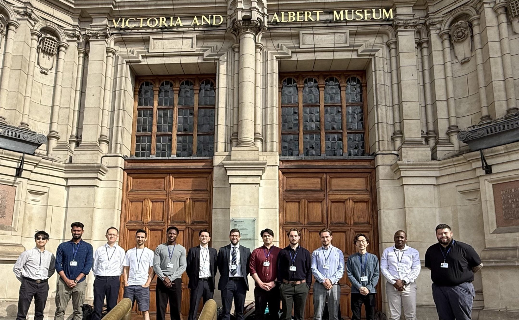 Group of Pick Everard employees lined up outside the Victoria and Albert Museum