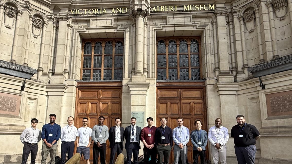 Group of Pick Everard employees lined up outside the Victoria and Albert Museum
