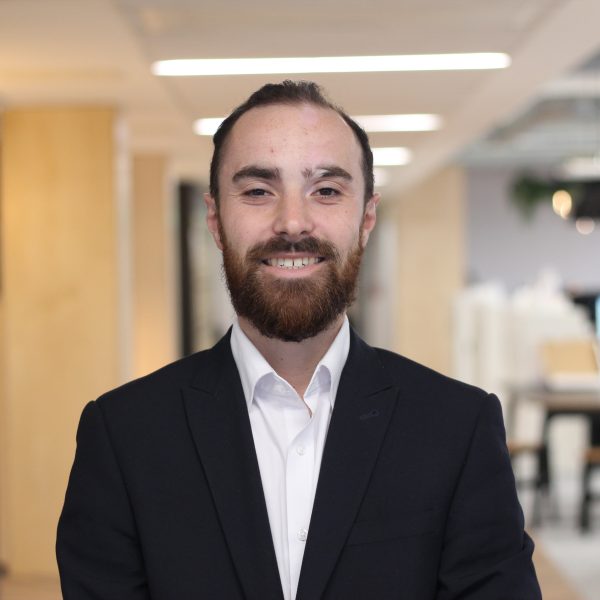 Headshot of James Nelson in the office