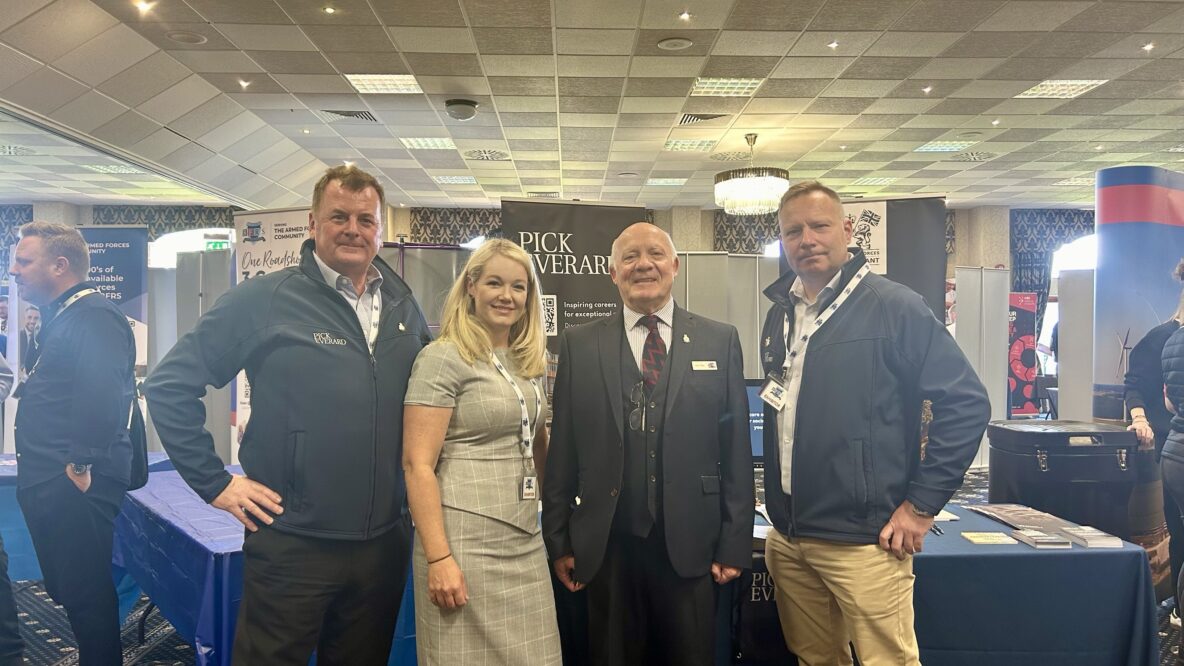 The team at a careers fair with BFRS Harry Dean